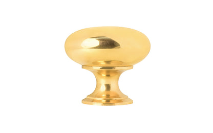Vintage-style Hardware · Traditional & Classic Unlacquered Brass Knob. 1-1/4" diameter size knob. This stylish round cabinet knob has a smooth look & feel on a pedestal shaped base. Great for kitchens, bathrooms, furniture, cabinets, drawers. Non-lacquered brass (un-lacquered brass will patina). Authentic reproduction hardware.