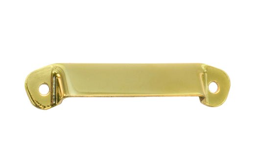 A simple & traditional stamped brass Hoosier utility pull with 2-3/4" on centers. They were made primarily in Indiana (hence the Hoosier name) by several companies, among them The Hoosier, Sellers, McDougall, Napanee, Wilson, Boone & others. Non-lacquered brass (the un-lacquered brass will patina over time). Unlacquered brass. 
