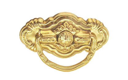 Vintage-style Traditional Hardware · Stamped brass drop pull in the Colonial Revival style. Made of stamped brass material with a nice detailed design of a "flower" at its center. Timeline: Early 20th Century, Colonial Revival, Depression Era, Waterfall style. Unlacquered brass. Non-lacquered brass