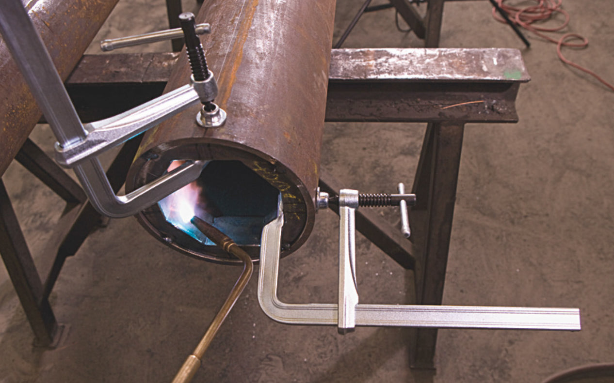 This 18" Bessey All-Steel "F-Style" Bar Clamp 1200-S18 has a patented rail profile that offers more clamp force with fewer spindle turns. U-shaped sliding arm offers straight line power for great stability. Heat treated, high carbon Acme threaded screw is tempered & quenched, which gives greater load capacity.