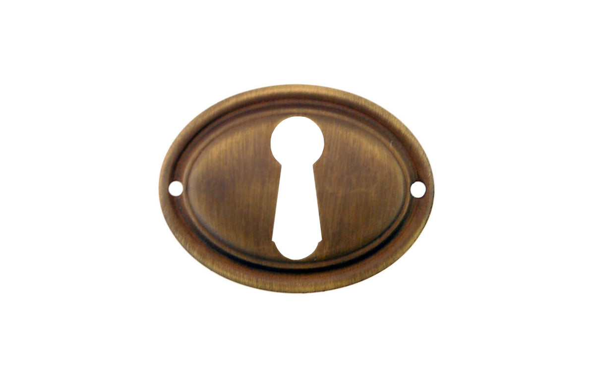 Stamped Brass Horizontal Oval Keyhole ~ Non-Lacquered Brass (will patina naturally over time)Vintage-style Hardware · This traditional & classic Stamped Brass Horizontal Oval Keyhole is an attractive & stylish keyhole piece made of quality stamped brass material with a nice trim, & adds some character & style to your cabinets, drawers, & furniture. Antique brass finish