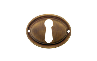 Stamped Brass Horizontal Oval Keyhole ~ Non-Lacquered Brass (will patina naturally over time)Vintage-style Hardware · This traditional & classic Stamped Brass Horizontal Oval Keyhole is an attractive & stylish keyhole piece made of quality stamped brass material with a nice trim, & adds some character & style to your cabinets, drawers, & furniture. Antique brass finish