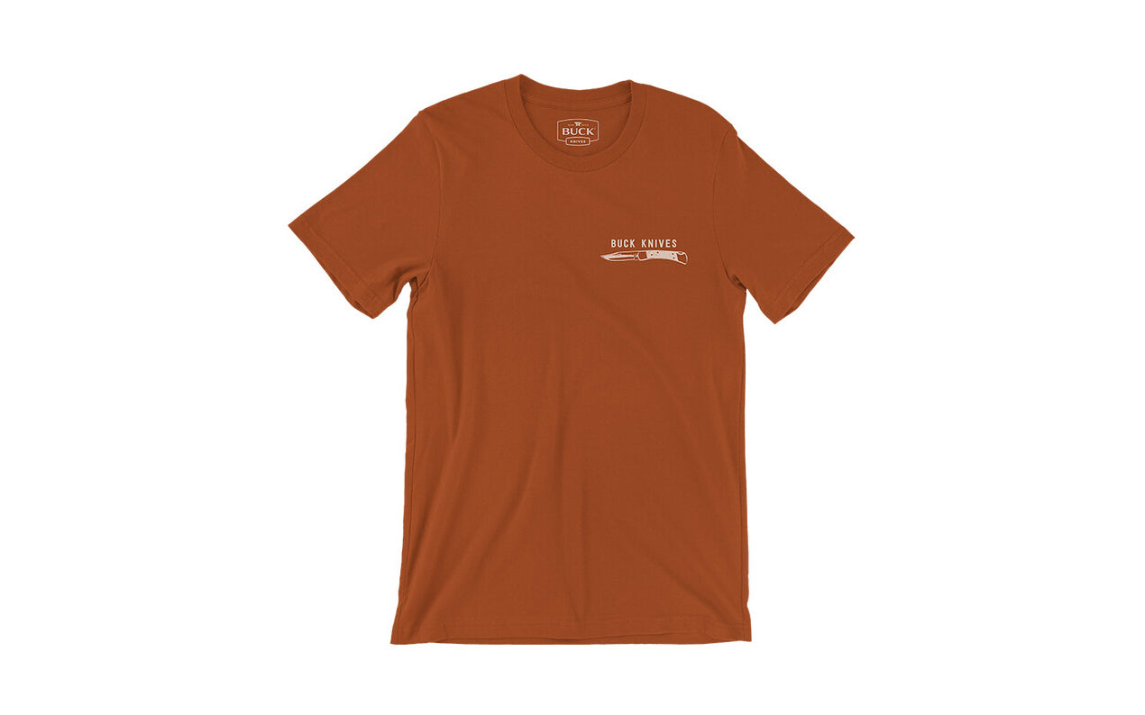 Buck Knives Copper / Rust Orange Color T-Shirt. 100% ring spun cotton. Front side has Buck Knife with "Buck Knives" text in the upper corner & the back of the t shirt has four classic blades shown.