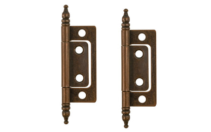 Traditional & classic 2" size non-mortise steeple-tip steel cabinet hinges. Surface mount & great for inset cabinet doors & bi-fold doors. These steeple tip finial hinges are designed in the early 20th century style / Arts and Crafts style of hardware. Antique copper finish on steel material. Two hinges in pack.