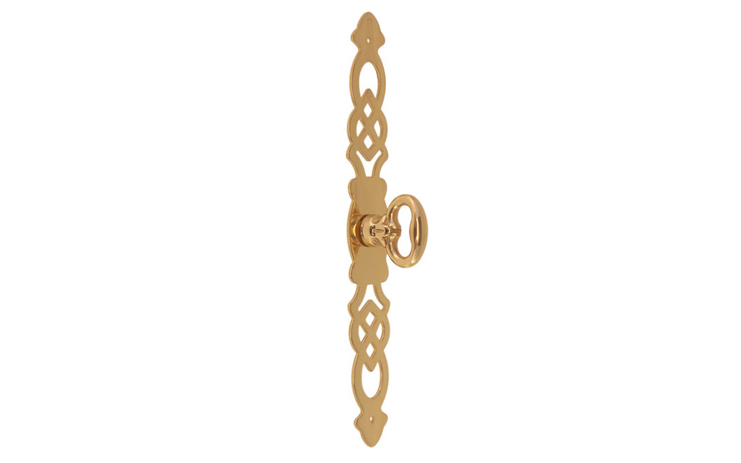 Solid Brass Cabinet Door Pull with 6-3/4" Backplate designed in the Chippendale Style. Designed for China cabinets, large cabinets, wardrobes, drop fronts, entertainment centers, etc. Lacquered brass finish. Cast brass key bow is 1-1/8" high, projects 1-1/16"