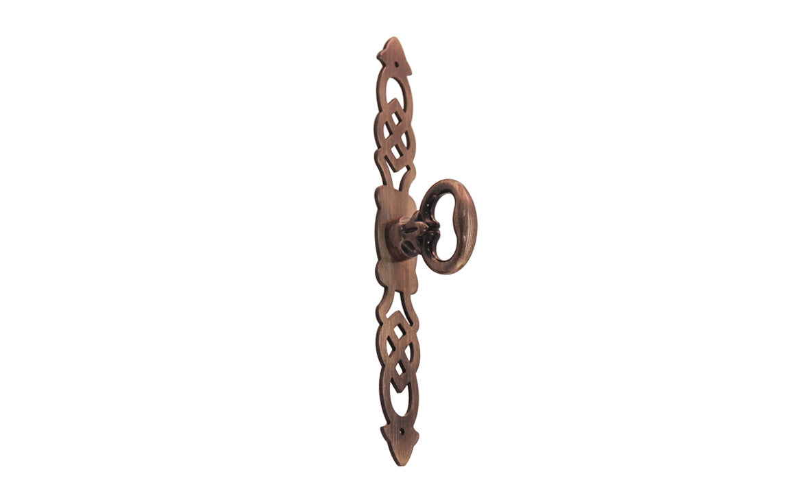 Solid Brass Cabinet Door Pull with 5-1/4" Backplate designed in the Chippendale Style. Designed for China cabinets, large cabinets, wardrobes, drop fronts, entertainment centers, etc. Antique brass finish. Cast brass key bow is 1-1/8" high, projects 1-1/16"