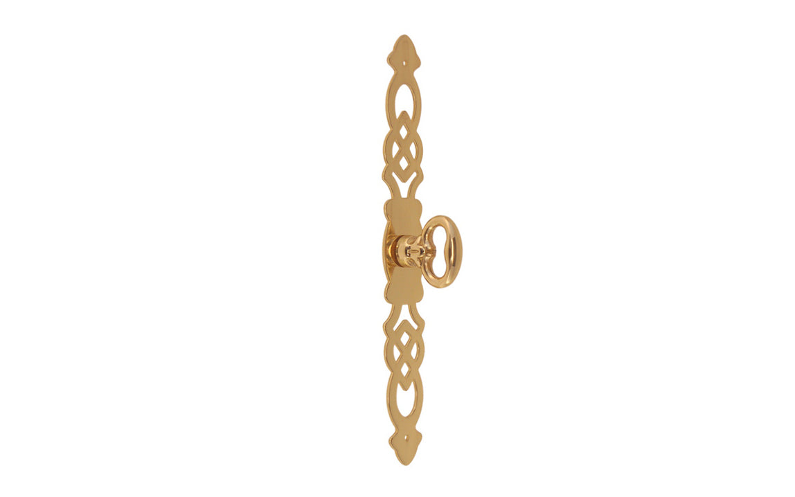 Solid Brass Cabinet Door Pull with 5-1/4" Backplate designed in the Chippendale Style. Designed for China cabinets, large cabinets, wardrobes, drop fronts, entertainment centers, etc. Lacquered brass finish. Cast brass key bow is 1-1/8" high, projects 1-1/16"