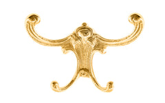 Vintage-style Victorian Unlacquered Brass Four-Prong Hook. Great for use in hallways, furniture, hall trees, bedrooms, & many other places. The hook is made of solid brass material, great for heavy coats & clothing. Four hooks. Designed in the Victorian, Late 19th Century, American Oak, Golden Oak style hardware.