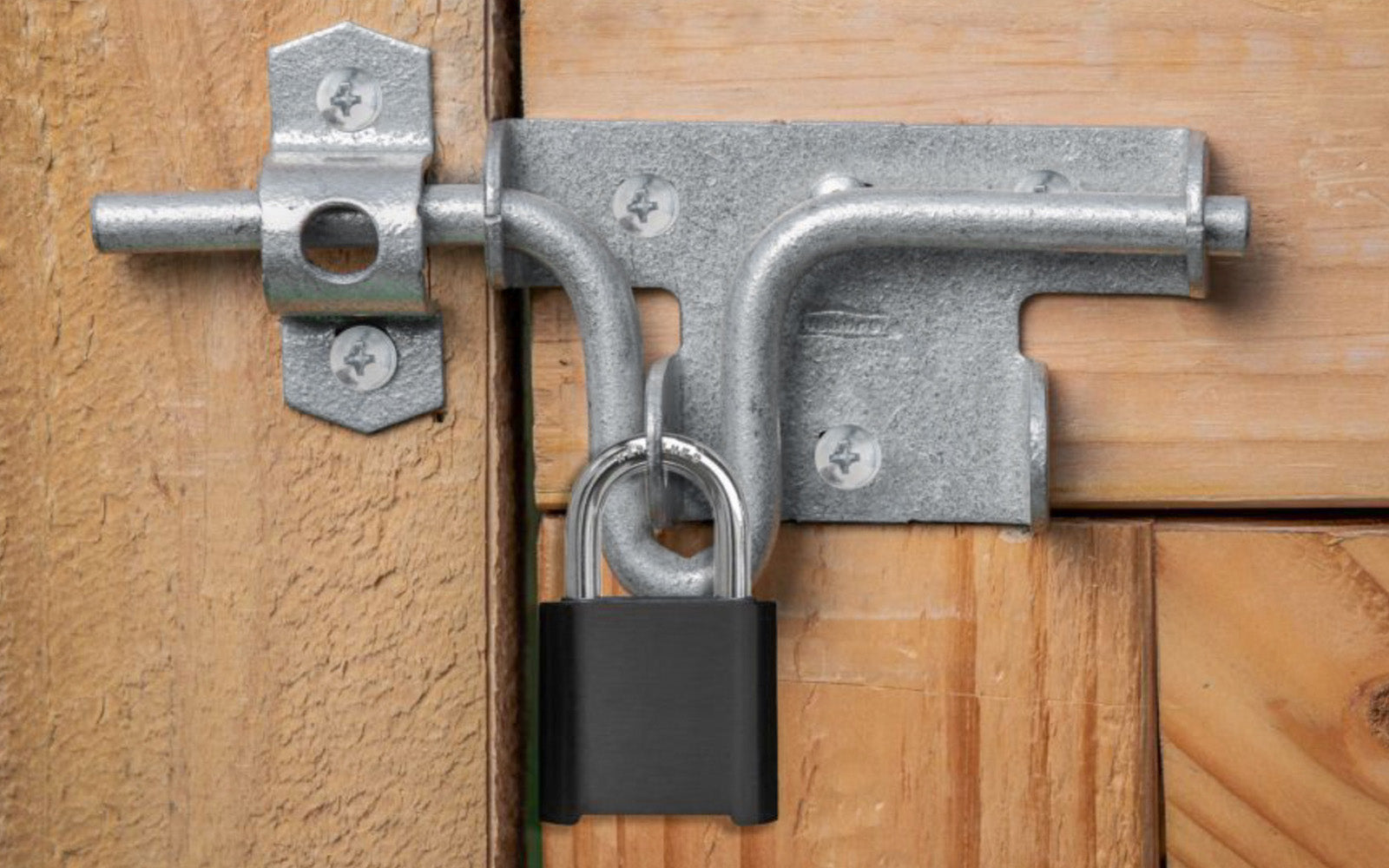 Galvanized Finish Sliding Bolt Latch. Designed for doors & gates swinging in or out. Easy operating, handle serves as a pull. Slide bolt latches right or left. May be padlocked. National Hardware Catalog Model No. N262-147.
