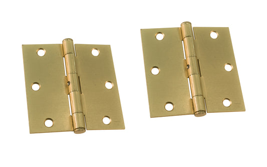 A pair of 3-1/2" Satin Brass Door Hinges with square corners & a removable pin. Satin Brass finish on steel material. Countersunk holes. Includes flat head screws. 3-1/2" x 3-1/2" door hinge size. Five knuckle, full mortise design. Ultra Hardware No. 35212.