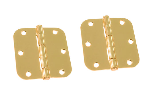 A pair of 3-1/2" Bright Brass Door Hinges with 5/8" radius corners & a removable pin. Bright Brass finish on steel material. Countersunk holes. Includes flat head screws. 3-1/2" x 3-1/2" door hinge size. Five knuckle, full mortise design. Ultra Hardware No. 35770.