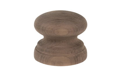 A classic walnut wood round cabinet knob with a large pedestal shaped base. Made of unfinished walnut wood. These knobs may be stained, painted, or varnished if desired. 2" Diameter Knob.