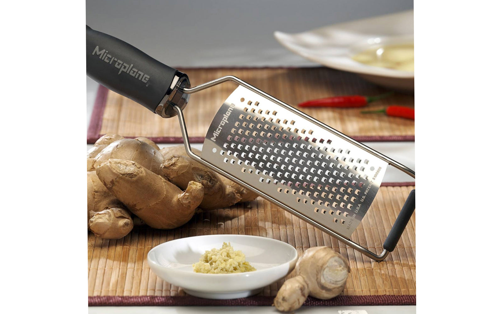 Made in USA - Blade made in USA - Great for grating hard cheese, carrots, garlic, chocolate, coconut - Non-slip grip - Dishwasher safe - Razor-sharp blades made from stainless steel - 18/8 grade - Ergonomically designed handle ~ No-slip base - Gourmet Series Coarse Grater - 098399450001 - non-skid foot -  Model 45004