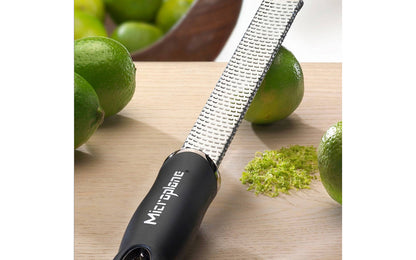 Made in USA - Blade made in USA - Great for grating hard cheeses & Citrus - Non-slip grip - Dishwasher safe - Sharp blades made from stainless steel - 18/8 grade - Ergonomic handle ~ No-slip base - Lemon Zester - Lime Zester - Microplane Fine Zester - Fine Grating - Microplane Premium Zester - Parmesan Reggiano Grater - Model 46020
