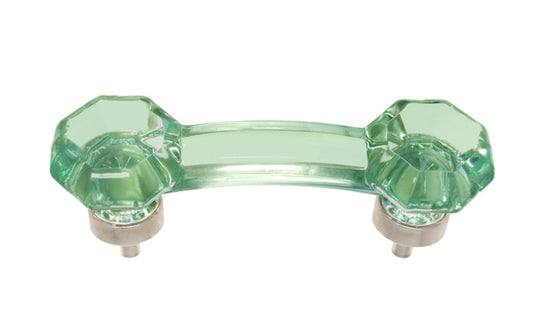 Elegant & classic octagonal cabinet glass pull with an attractive "Depression Green" color. The pull handle has 3" on centers. The glass is carefully set into a handsome solid brass bases with threaded shanks in the back. Octagon Glass pull. 3" center to center. Brushed nickel finish on brass base.