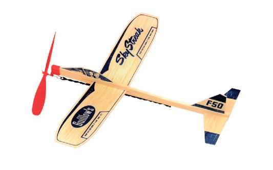 Guillow's "Sky Streak" is a long time best selling toy motorplane. This Balsa wood glider airplane has a 1-piece wing with a built-in dihedral. The propeller & nose bearing made of high-impact plastic. Model No. 50. Made by Guillow's. 12" wingspan. 072365000506