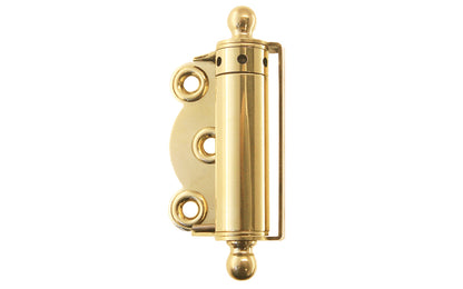 Traditional half surface brass spring hinge with solid brass ball-tips with a concealed spring. Designed for screen doors & other light duty self-closing doors. 2-3/4" high hinge size. Solid Brass Ball Tip Screen Door Hinge. Unlacquered Brass (will patina over time). Non-lacquered brass. Un-lacquered Brass.