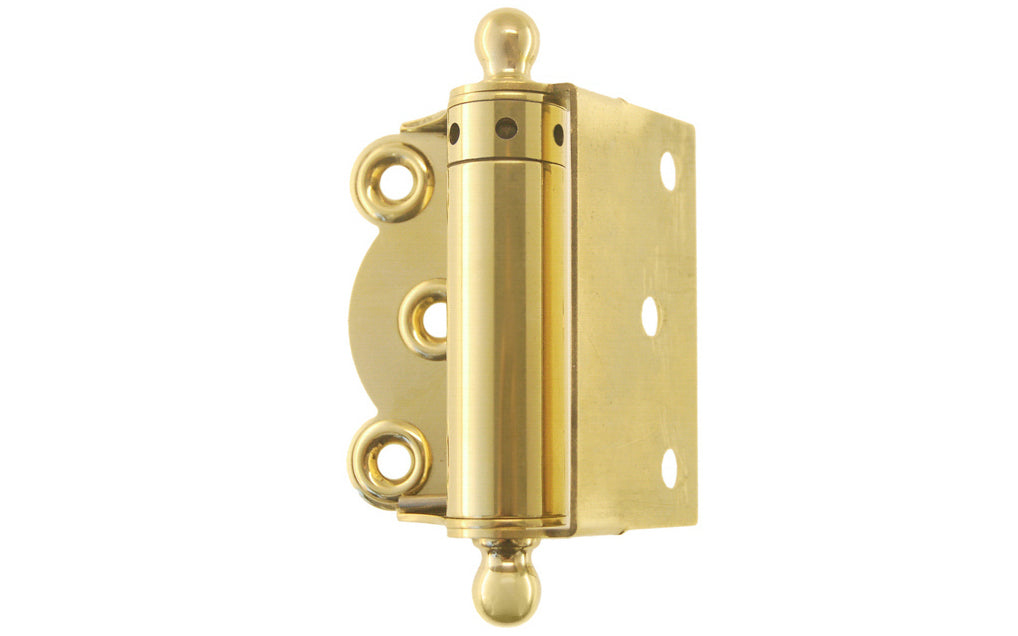 Traditional half surface brass spring hinge with solid brass ball-tips with a concealed spring. Designed for screen doors & other light duty self-closing doors. 2-3/4" high hinge size. Solid Brass Ball Tip Screen Door Hinge. Lacquered Brass Finish.