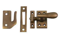Classic & Traditional Solid Brass Casement Window Latch ~ Large Size. 2" high x 1-1/8" wide latch turn base. Locks & tightens window frames or small doors. Reversible for right or left applications. Vintage-style casement window lock. Antique Brass Finish.