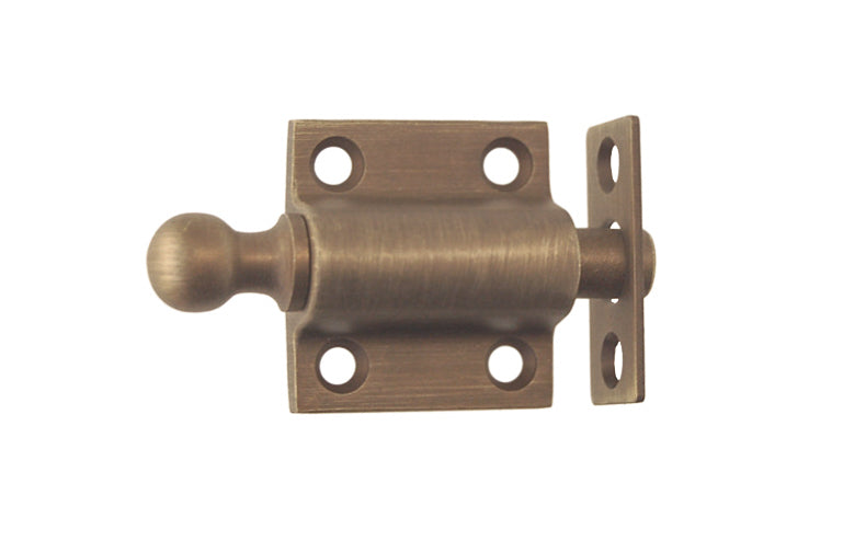Vintage-style Hardware · Solid Brass Ventilating Sash Spring-Loaded Bolt designed for holding a sliding sash in either an open or closed position. Made of quality solid brass material for durability. Plunger has a 5/8" diameter & is spring loaded. It may be kept in a retracted position by turning the knob on the bolt. Antique Brass Finish.