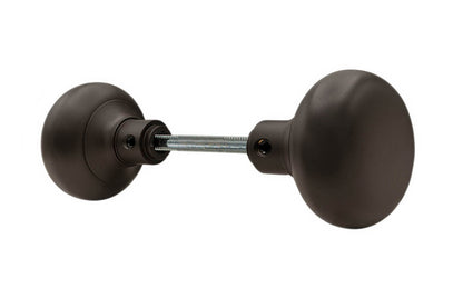 Pair of Traditional & Classic Brass Smooth Design Doorknobs with spindle. Quality hollow core wrought brass doorknobs with an attractive circle-ring design. Reproduction Brass Door Knobs. Traditional Brass Knobs with Spindle. Oil Rubbed Bronze Finish.