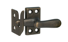 Classic & Traditional Solid Brass Casement Window Latch ~ Regular Size. 1-9/16" high x 7/8" wide latch turn base. Locks & tightens window frames or small doors. Reversible for right or left applications. Vintage-style casement window lock. Dark Antique Brass Finish.