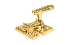Classic & Traditional Solid Brass Casement Window Latch ~ Regular Size. 1-9/16" high x 7/8" wide latch turn base. Locks & tightens window frames or small doors. Reversible for right or left applications. Vintage-style casement window lock. Unlacquered Brass (will patina over time). Non-lacquered brass. Un-lacqeured brass.