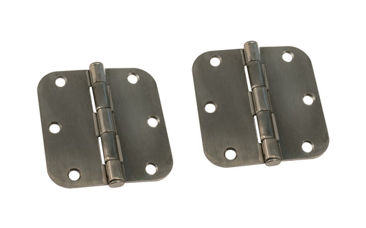 A pair of 3-1/2" Antique Nickel Door Hinges with 5/8" radius corners & a removable pin. Antique Nickel finish on steel material. Countersunk holes. Includes flat head screws. 3-1/2" x 3-1/2" door hinge size. Five knuckle, full mortise design. Ultra Hardware No. 35043.