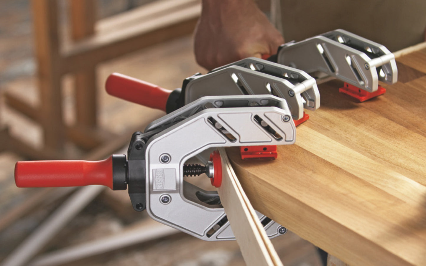 This Bessey One-Hand Edge Clamp EKT-55 is made of lightweight Aluminum construction which makes EKT the perfect tool to secure edge banding with just one hand & improve productivity. Two large non-slip, opposing, gentle jaws for positive grip. The jaws have a non-slip plastic coating for a solid grip. Made in Germany 