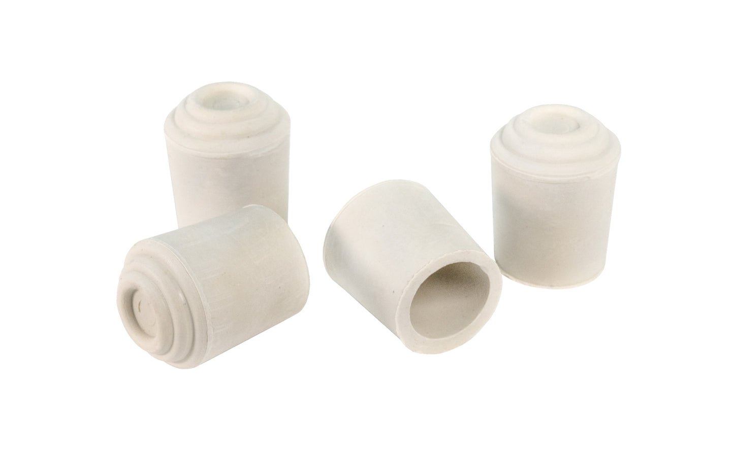 5/8" I.D. White/Beige Rubber Leg Tips. 1-1/8" high tips. Made by Faultless Caster Corp. Made in USA.