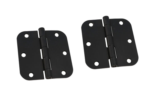 A pair of 3-1/2" Flat black Door Hinges with 5/8" radius corners & a removable pin. Flat black finish on steel material. Countersunk holes. Includes flat head screws. 3-1/2" x 3-1/2" door hinge size. Five knuckle, full mortise design. Ultra Hardware No. 35229.