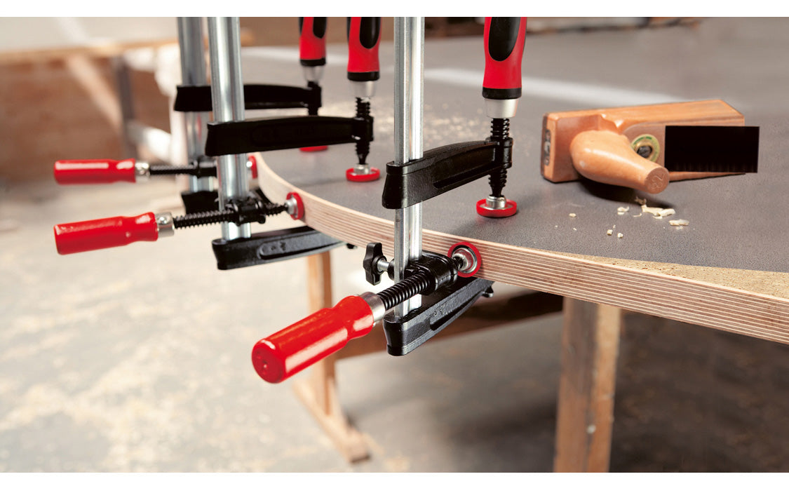 This Bessey single screw edge clamps is suitable for conventional screw clamps with a max rail thickness of 1/2" (13 mm). Comes with a plastic pressure cap to protect the work surface - Model No. KT5-1CP - 091162006757 - Double Screws  - With Wooden Handles - One Screw Edge Clamp - Single Screw Clamps