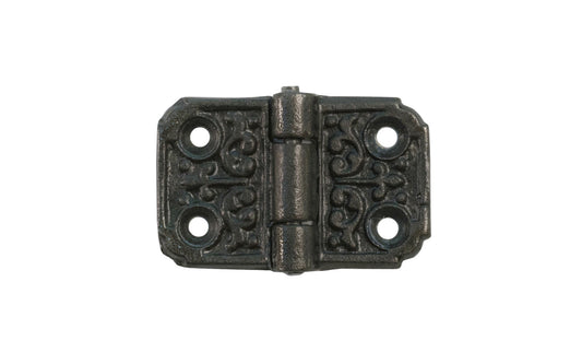  Small Cast Iron Decorative Hinge. small cast iron hinge with decorative detail. Made of strong cast iron material, it has a nice durable & strong feel. Vintage-style finish with lacquer to resist rust. 1-1/4" High  x  2-1/16" Wide.
