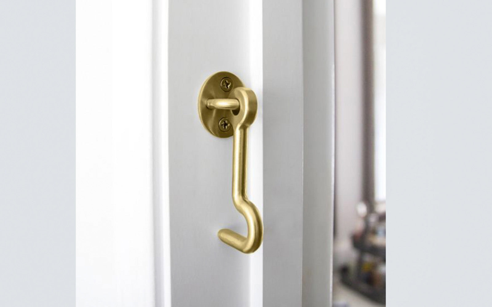 4" Brushed Gold (Brushed Brass) Privacy Hook. Designed for interior barn door hardware. Adds a privacy function to any sliding door hardware door. Includes fasteners. Sold as a single hook and pad. Includes four flat head phillips screws. National Hardware model N700-154. 886780028195