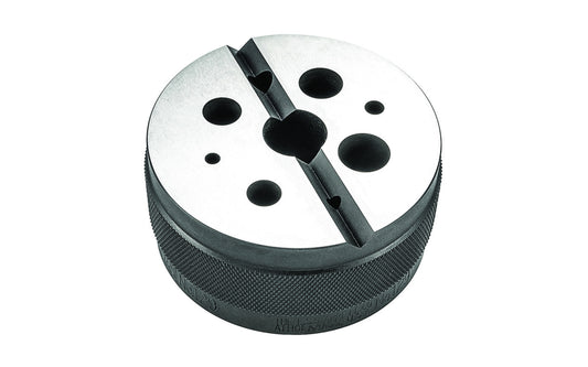 The Starrett Round Bench Block is useful for holding work when driving pins, drilling, etc. 3" (75mm) in diameter by 1-1/2" (38mm) high with oversize holes from 1/8 to 5/8" (3-16mm) diameter and one v-groove. Made in USA.