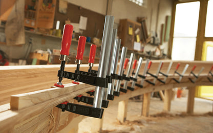 This Bessey 30" Medium-Duty Steel Bar Clamp head is made of malleable cast iron. Fixed jaw & sliding arm generates powerful & rigid clamping. Wooden handles - 1000 lb. clamping pressure - Model TG4.530 - "TG series" Bessey Clamps 30" max opening - 4-1/2" throat depth - Made in Germany - 091162007587. Medium Duty Clamp