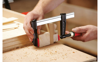 Bessey Light-Duty Steel Bar Clamps heads are made of malleable cast iron. The fixed jaw & sliding arm generates powerful & rigid clamping - acts against torsional forces - Wooden handles - 880 lbs. clamping pressure - Model No. TG4.008 - "TG series" Bessey Clamps 8" max opening - 4" throat depth - Made in Germany - 091162007044