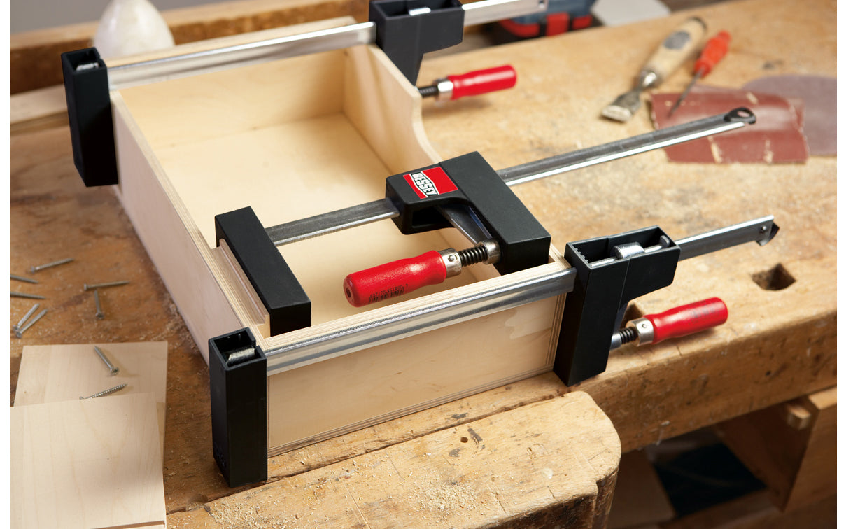 Bessey "UniKlamp" is a light duty universal clamp/spreader for bench top projects with a lighter frame & rail. Gentle touch jaws distribute the clamping pressure along the entire length of the rail & are ideal for sensitive work pieces & right angles. 24" max opening - 3-1/8" throat depth - Model UK3.024 - Wood handles - 091162006719