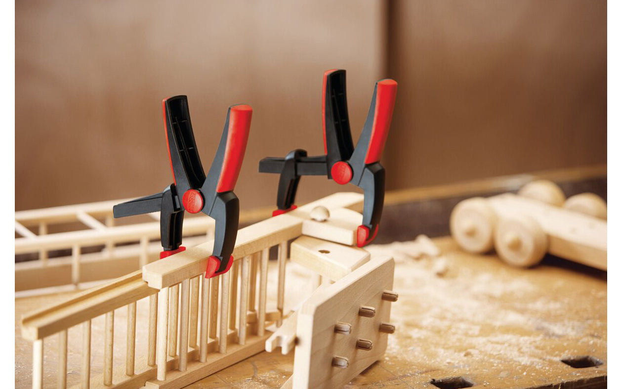 Bessey Clamps Model No. XV5-100 - These variable spring clamps from Bessey can clamp on items and have 4" max opening. 2" depth reach. They have soft-touch swivel pads that prevent marring of soft work & the handles remain in constant easy-to-grip position at all openings. Soft & non-slip two component ergonomic handle