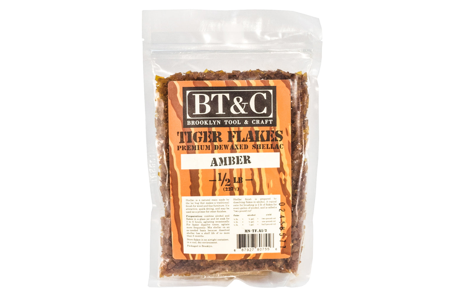 Dewaxed Amber Shellac Tiger Flakes - 1/2 lb Bag - Refined in Germany ~ once dissolved in alcohol, will make a beautiful finish for woods, cork, plaster, & metals. They are refined for a clear finish. Great for French Polishing - De-waxed Amber flakes
