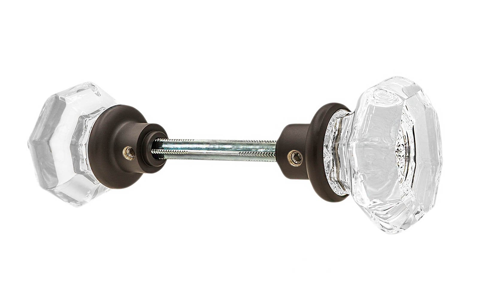 A high quality & genuine glass doorknob set with an attractive octagonal design. The sparkling center point under the glass amplifies reflected light to showcase beautiful facets. The rim of the brass base folds over the base of the glass knob for a secure grip. Oil Rubbed Bronze Finish