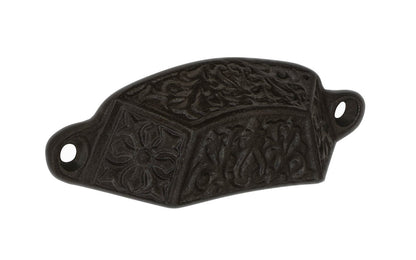 Rustic-looking & ornate cast iron bin pull with a very nice & charming floral "Thistle" detail. Cast iron material, it is thick & stout with a good grip. Originally from 19th century, great for adding charm & style to your cabinets & drawers. Vintage finish with lacquer to resist rust - Victorian - 88604 - Drawer Pull