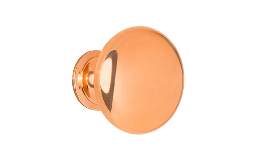 Vintage-style Hardware · Traditional & Classic Brass Knob with a Polished Copper Finish. 1-1/4" diameter size knob. Made of high quality brass, this stylish round cabinet knob has a smooth look & feel on a pedestal shaped base. Works great in kitchens, bathrooms, on furniture, cabinets, drawers. Authentic reproduction hardware.