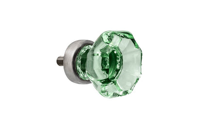 Elegant & classic octagonal cabinet glass knob with an attractive "Depression Green" color. The glass is carefully set into a handsome solid brass base with a threaded shank in the back. Brushed nickel finish on solid brass base. Octagon shape knob.  1" Diameter Knob 