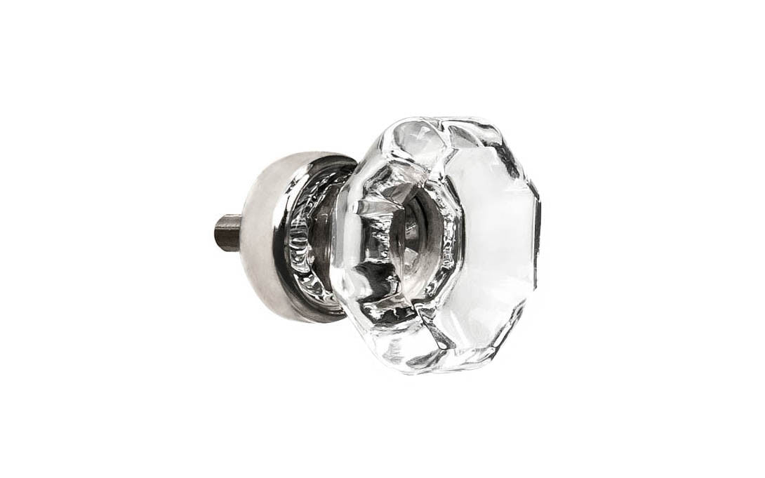 Elegant & classic octagonal cabinet glass knob with attractive genuine clear glass. The glass is carefully set into a handsome solid brass base with a threaded shank in the back. Polished nickel finish on solid brass base. Octagon shape knob. 1