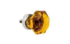 Elegant & classic octagonal cabinet glass knob with an attractive "Amber" color. The glass is carefully set into a handsome solid brass base with a threaded shank in the back. Polished nickel finish on solid brass base. Octagon shape knob. 1" Diameter Knob