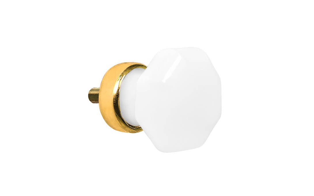 Elegant & classic octagonal cabinet glass knob with an attractive "Translucent White Opal" color. The glass is carefully set into a handsome solid brass base with a threaded shank in the back. Unlacquered brass base - Will patina naturally over time. Octagon shape knob. 1" Diameter Knob 