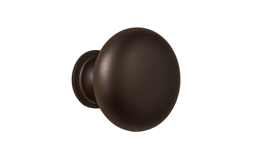 Vintage-style Hardware · Traditional & Classic Brass Knob with an Oil Rubbed Bronze Finish. 1-1/4" diameter size knob. Made of high quality brass, this stylish round cabinet knob has a smooth look & feel on a pedestal shaped base. Works great in kitchens, bathrooms, on furniture, cabinets, drawers. Authentic reproduction hardware. 