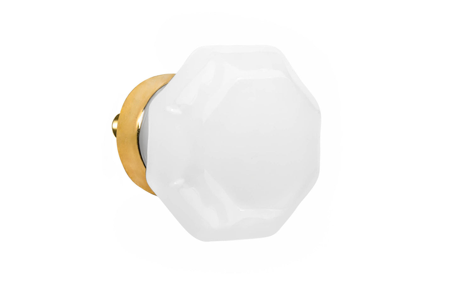Elegant & classic octagonal cabinet glass knob with an attractive "Translucent White Opal" color. The glass is carefully set into a handsome solid brass base with a threaded shank in the back. Unlacquered brass base - Will patina naturally over time. Octagon shape knob. 1-1/4" Diameter Knob 