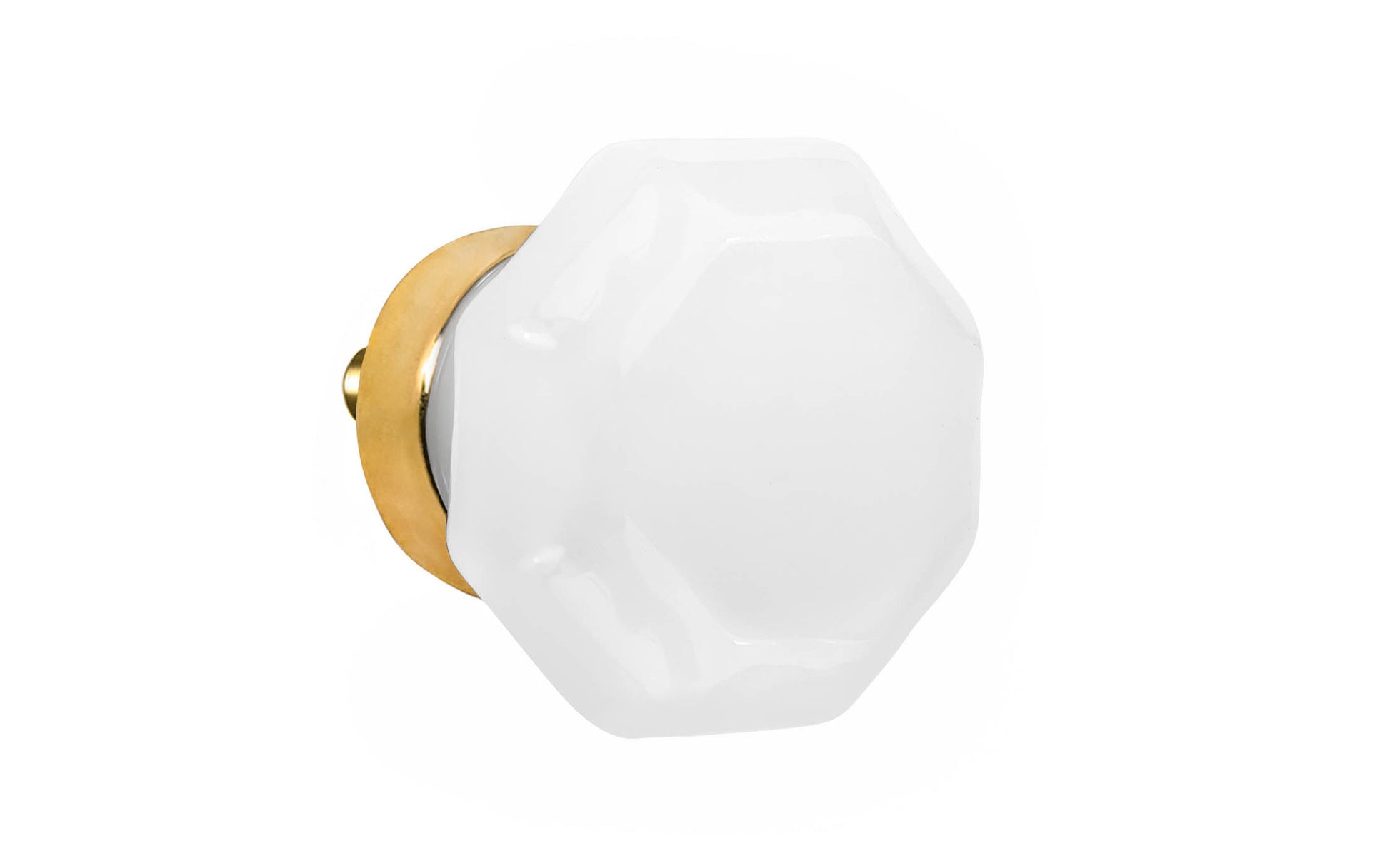 Elegant & classic octagonal cabinet glass knob with an attractive "Translucent White Opal" color. The glass is carefully set into a handsome solid brass base with a threaded shank in the back. Unlacquered brass base - Will patina naturally over time. Octagon shape knob. 1-1/4" Diameter Knob 